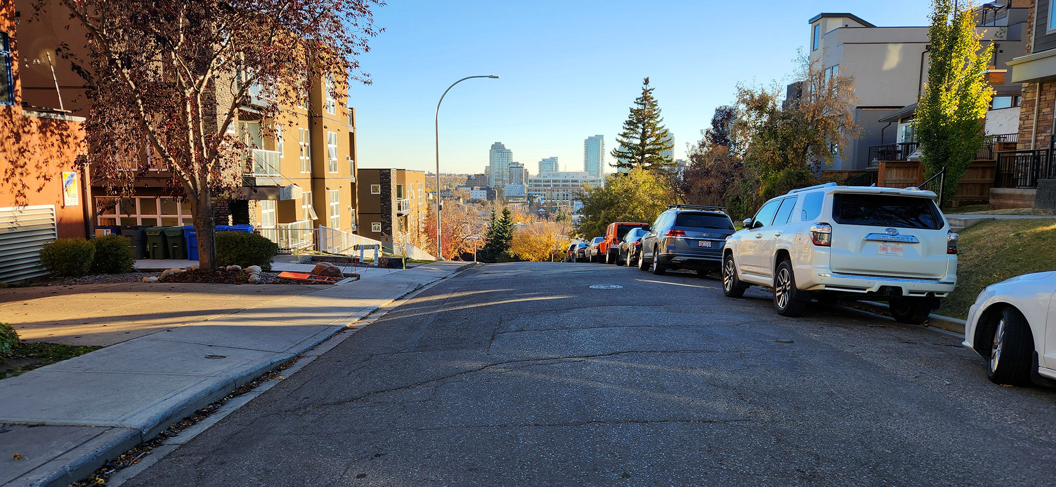 View as a narrow road opens to the downtown valley